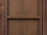 an old wooden frame with a window on the side of it