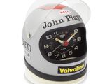 a close up of a clock with a helmet on it