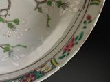a white plate with a floral design on it