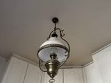 a light that is hanging from the ceiling in a room