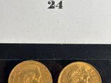 two gold sovereigns, one of which is a sovereign and the other of which is a sovereign