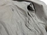 a close up of a jacket with a tie on it