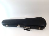 a black guitar case sitting on top of a white table
