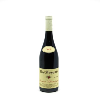 a bottle of wine that is sitting on a table