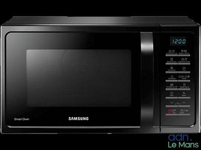 black samsung microwave oven on a black background with the words samsung on it