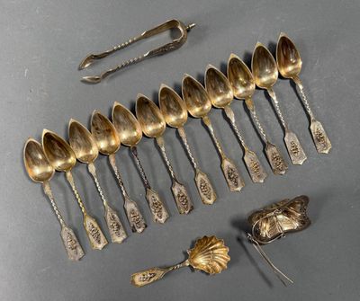 a lot of silver spoons and spoon spoons on the table