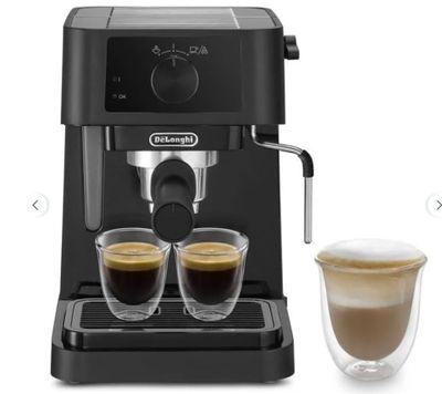 a black coffee machine with two cups of coffee next to it