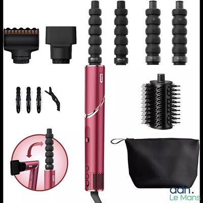 une image représentant un sèche-cheveux accompagné d'une brosse, d'un peigne et d'autres accessoires