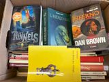 a box full of books that are sitting on a table