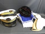 two hats that are sitting next to each other