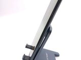 a cell phone that is sitting on top of a stand