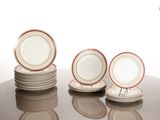 many plates stacked on top of each other on a table
