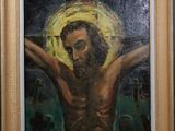 an oil painting of jesus on the cross in a wooden frame