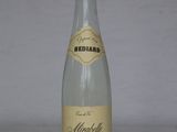 a bottle of alcohol that is sitting on a table