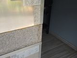 an image of a kitchen with a stove and a refrigerator