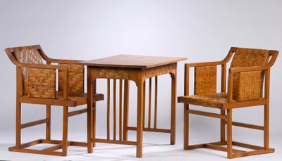 two chairs and a table with a wooden table and chairs