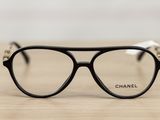 a close up of a pair of glasses on a table