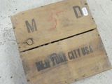 a wooden box with a sign on it that says new york city usa