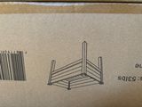 a cardboard box with a drawing of a chair on it