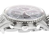 a close up of a watch with a white background
