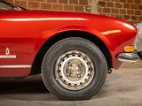 an image of a red car parked in a garage