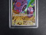 a close up of a card in a plastic case on a table