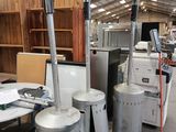 many different types of gas heaters in a warehouse