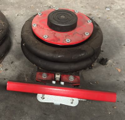 two black and red dumbbers sitting on the ground