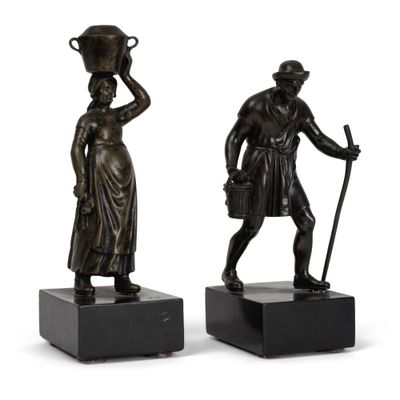 paire de figurines en bronze représentant un homme et une femme