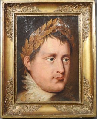 portrait of a young boy wearing a laurel crown