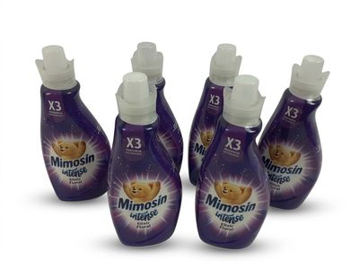 quatre flacons de savon Mimosil sur fond blanc