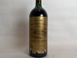 a bottle of wine that is sitting on a table