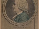 portrait of a man in a blue coat and white wig