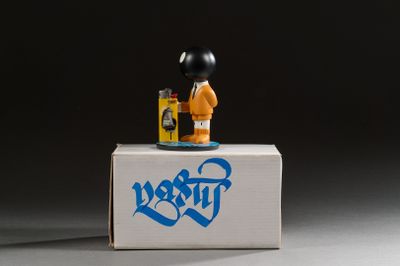 a lego man sitting on top of a box with a beer