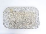 a stone tray with a white background on a table