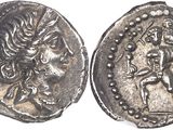 a close up of a silver coin with a woman on it
