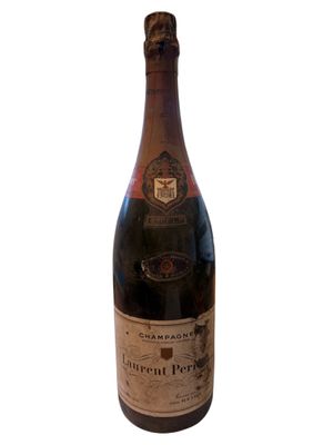 a bottle of wine that is sitting on a table