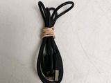 a close up of a usb cable connected to a charger
