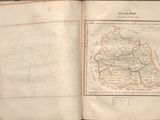 an open book with a map on it on a table