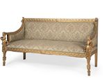 an image of a gold colored couch on a white background