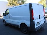 a white van that is parked in a parking lot