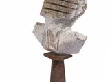 statue of a head on a pedestal with a white background