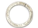 a close up of a silver ring on a white surface