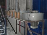 an image of a machine that is working in a factory