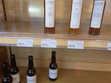 bottles of wine are on a shelf in a store
