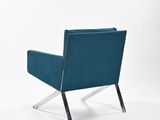 a blue chair with chrome legs and a blue upholstered seat