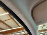 a close up view of the inside of a car ' s rear view mirror