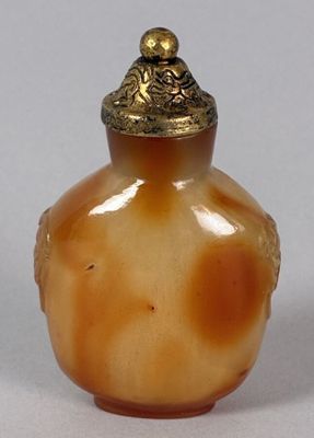 an image of a vase with a lid on a table