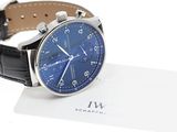 a watch that is sitting on top of a card