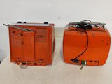 an image of a couple of orange appliances sitting on top of a table